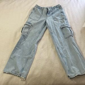 Light blue women’s cargo jeans.